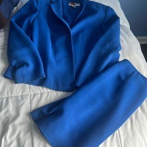 Bright blue suit.  Cute